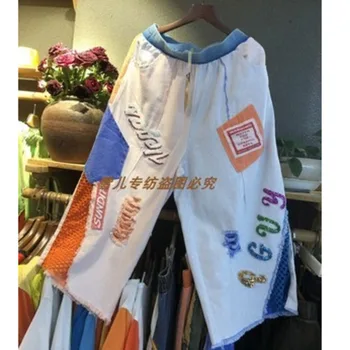 LYUZHE Verão as Mulheres de Cintura Elástica Calças Emendados Ocos Bordado Carta Calças Moda Buraco Grande Perna de Calça LYZ002