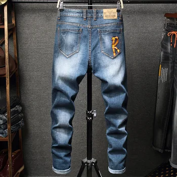 Novos Homens azuis Hip hop Personalidade impressa Destruído Buracos jeans Slim fit homens streetwear Algodão masculina de motociclista de Moto de Jeans, Calças