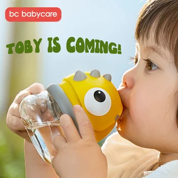 BC Babycare Crianças de Formação Sippy/bico de pato Copa do Bola de Gravidade ao ar livre Portátil do Bebê Estanque Dinossauro Handle/Funda Garrafas de Água