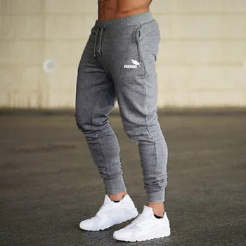 A Vogue de novo 2021 outono invernos é cultivar uma moralidade calças masculinas de fitness execução de lazer absorver o suor calças esportivas