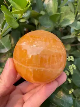 Belo natural de laranja calcita bola de cristal de energia natural bola de cristal 55-60mm